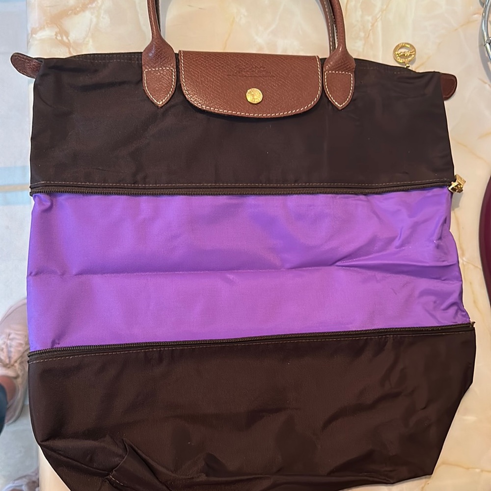Expandable Longchamp Le Pliage bag in brown and purple